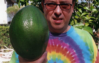 Gabriel Ramirez Nahim with his huge ass avocado. (Photo: Guinness Book of World Records)